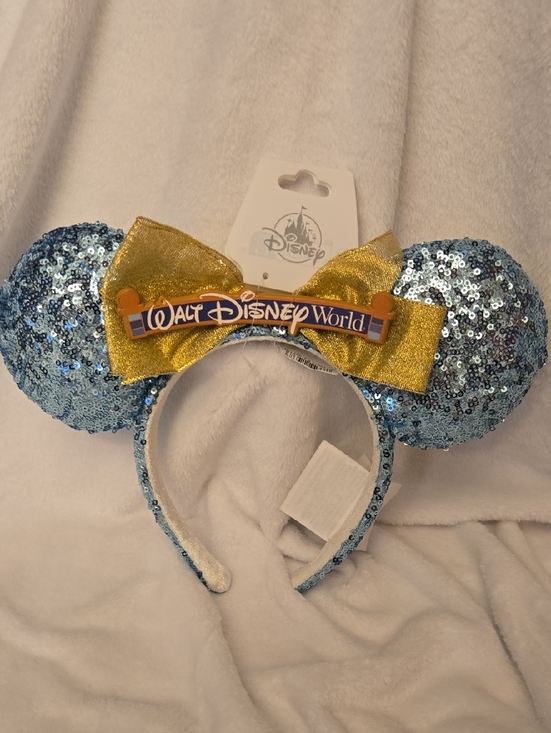 Disney Other - Disney Light Blue Sequin Minnie Ears Headband with Gold Bow